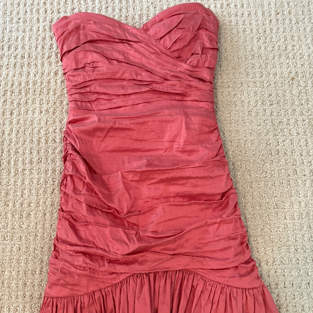 BCBGMaxAzria Fleur ruched mini in coral. Black lace at the hem